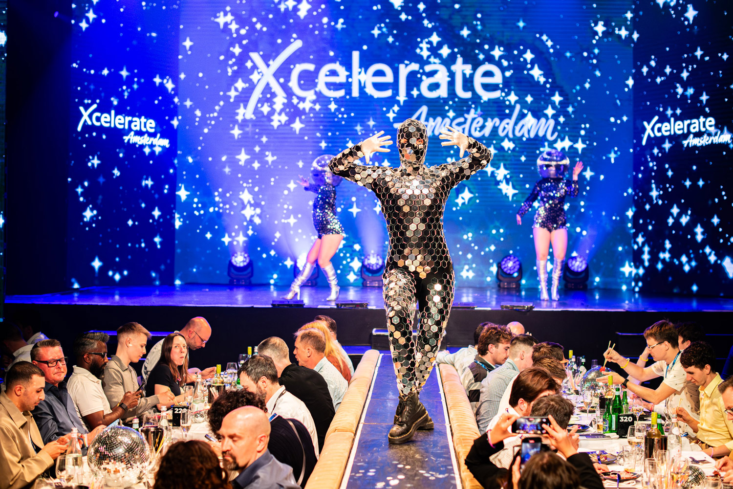 Energy Exemplar Xcelerate conference delegates and stage
